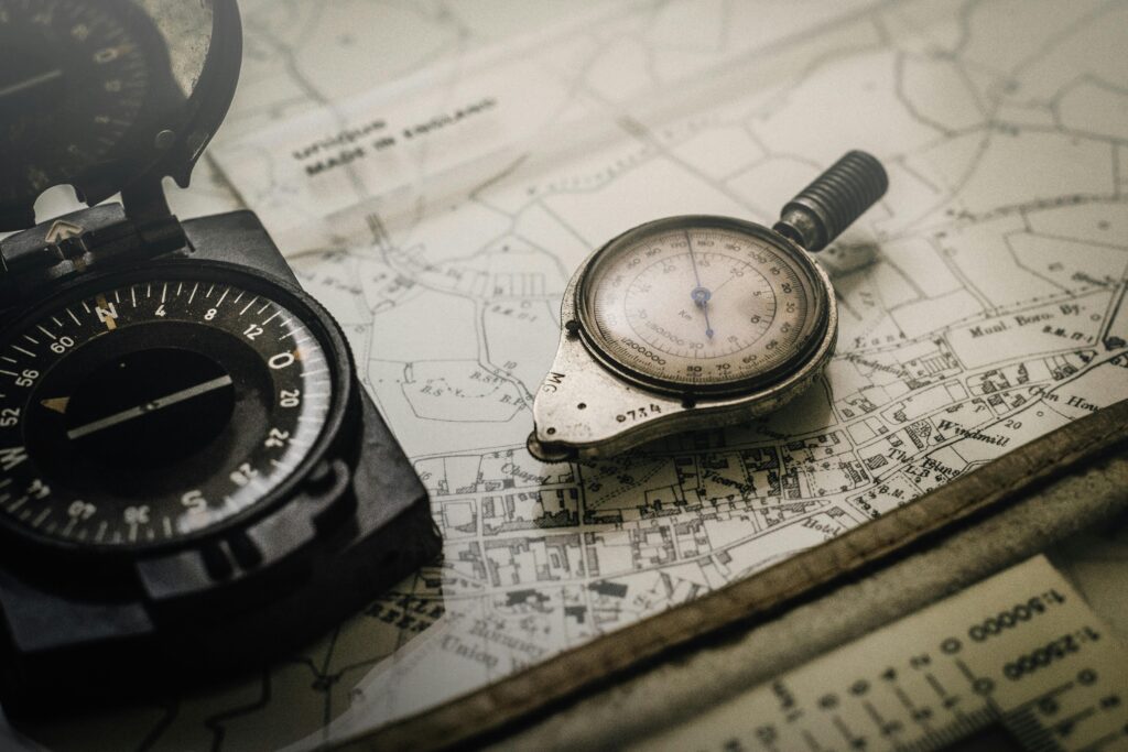 a map and compass act as a symbol of the significance in clear navigation for all users when conducting a website design for social change. 